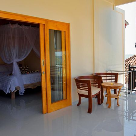 Ganesha Amed Hotel Quarto foto