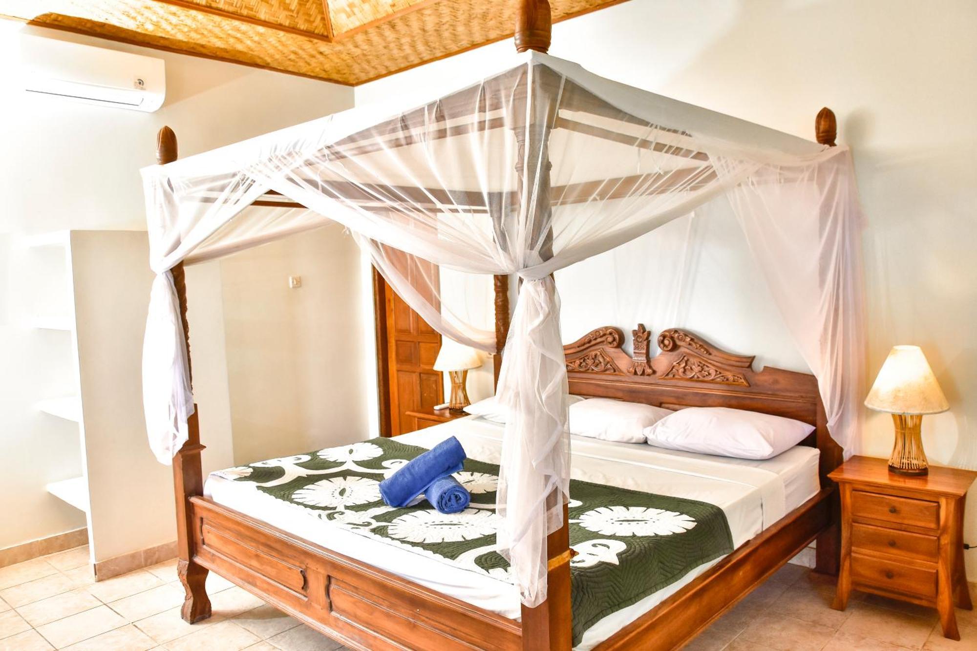 Ganesha Amed Hotel Quarto foto