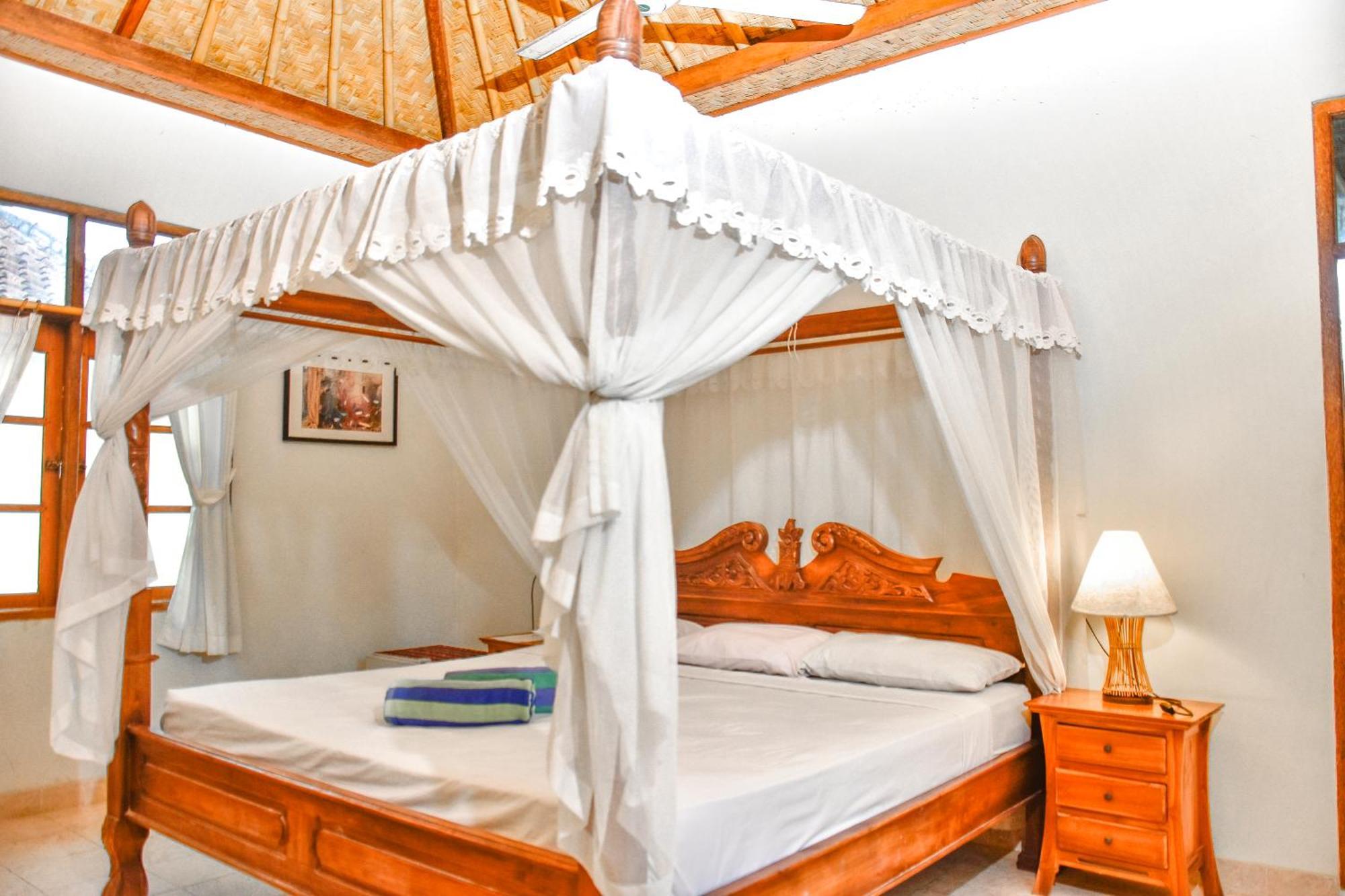 Ganesha Amed Hotel Quarto foto