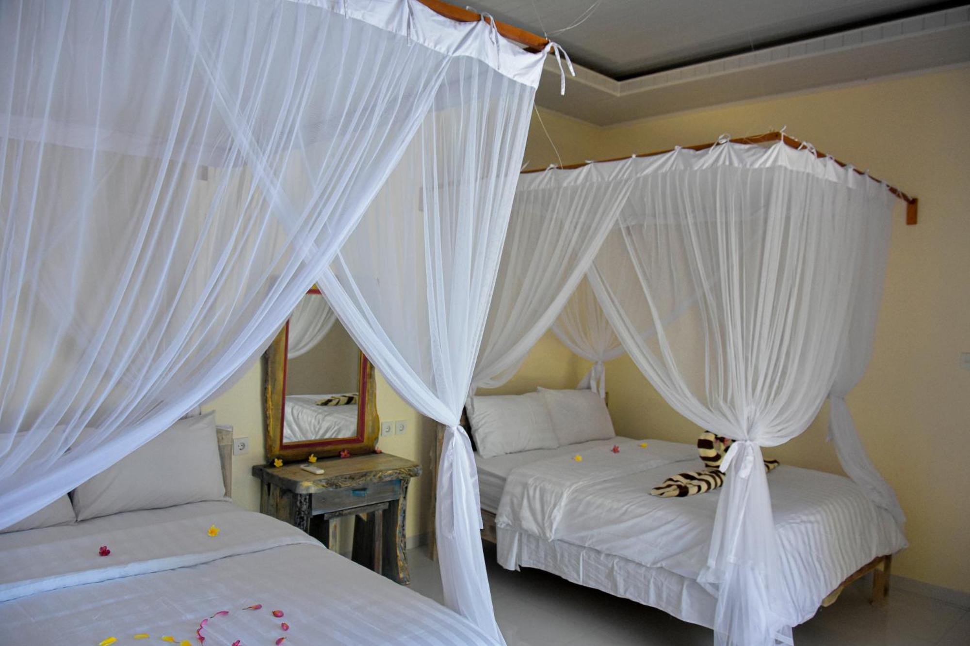 Ganesha Amed Hotel Quarto foto