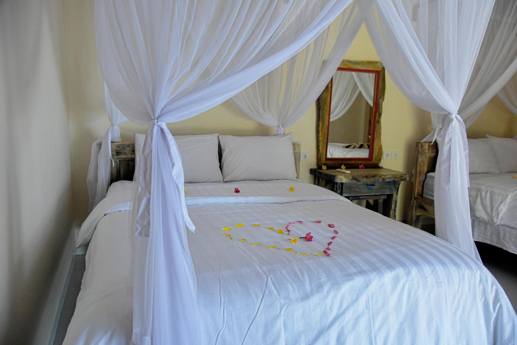 Ganesha Amed Hotel Quarto foto
