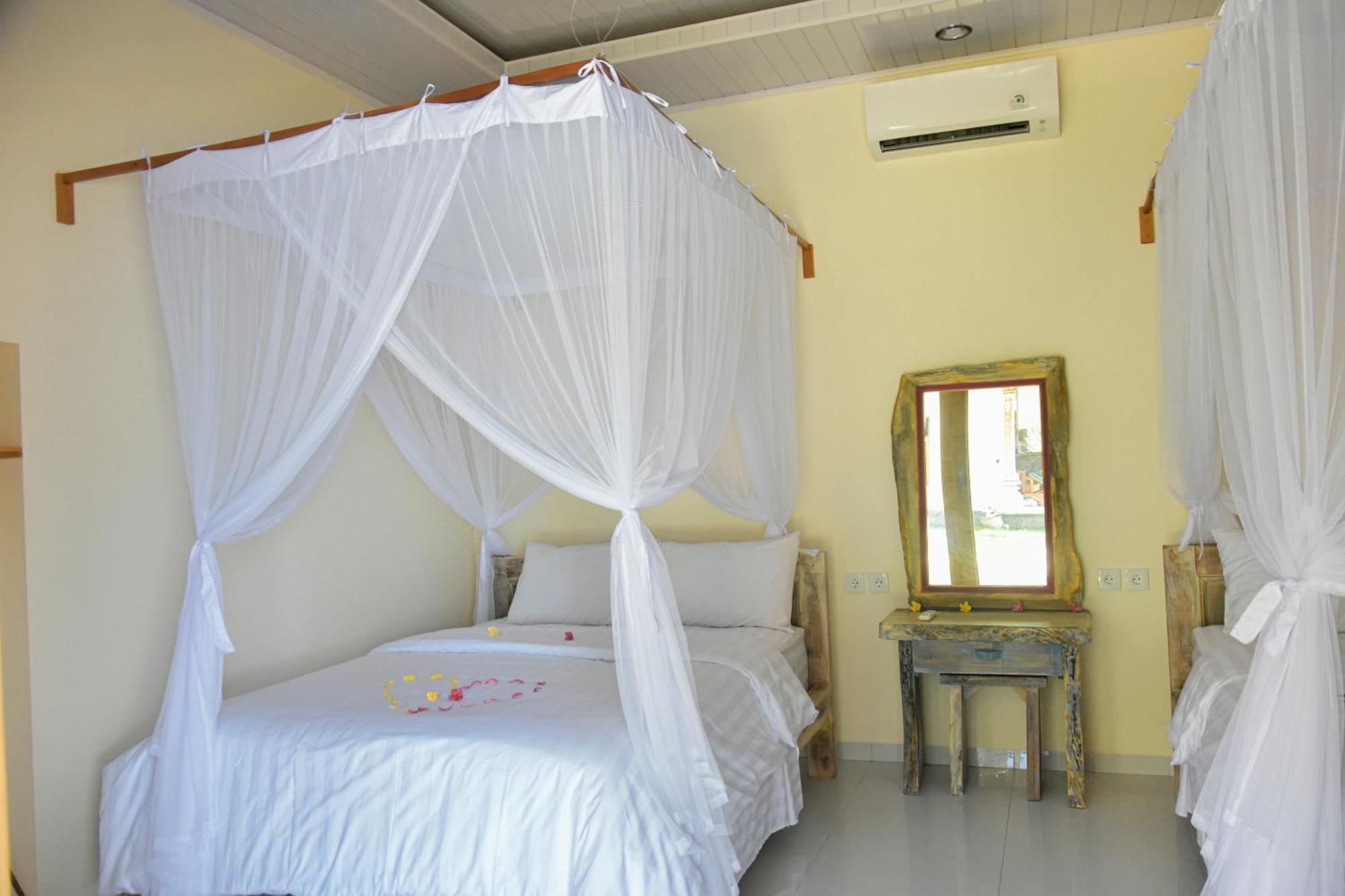 Ganesha Amed Hotel Quarto foto